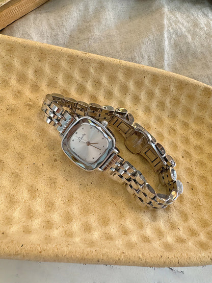 This new solid stainless steel mini square quartz watch features a casual, simple, stylish, waterproof design and a silver squar